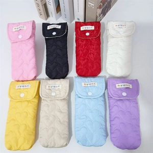 Quilted heart pattern eyewear cases in eight vibrant colors with secure button closures