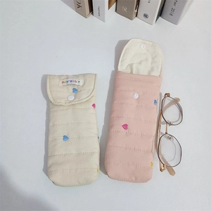 Quilted cotton pouch with heart embroidery for sunglasses storage and stationery