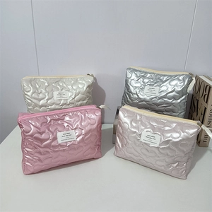 Quilted heart pattern PU leather cosmetic bags in silver, pink, gold, and purple colors