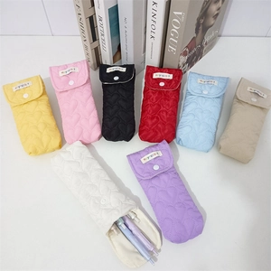 Detailed heart-quilted texture and snap closure on these colorful soft eyewear pouches