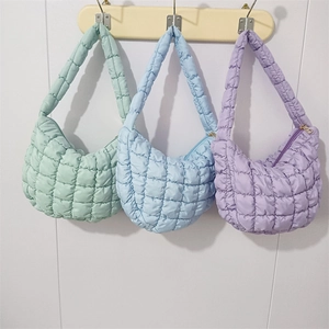 Quilted cloud shoulder bags in mint green, light blue, and lavender purple macro details