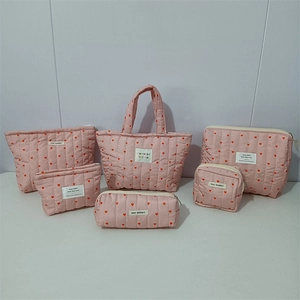 Pink quilted heart organizer set with tote bag and cosmetic pouches for students