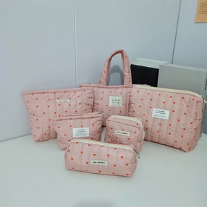 Pink heart quilted storage bag set including tote bag and cosmetic pouches with red prints