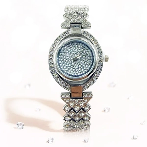 Sparkling silver women's watch with full crystal-set dial and elegant rhinestone-encrusted band