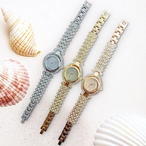 Elegant ladies quartz watch set in gold silver and rose gold with full crystal encrusted dial