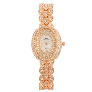 Elegant rose gold steel watch for women with rhinestones and oval crystal dial