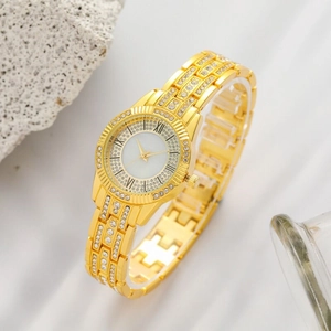 Detailed side view of luxury gold quartz watch featuring full rhinestones and Roman numerals