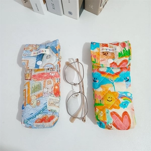 Quilted cotton eyeglasses cases with colorful cartoon prints and snap button closure