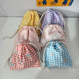 Set of six colorful floral gingham cotton drawstring pouches for small item storage