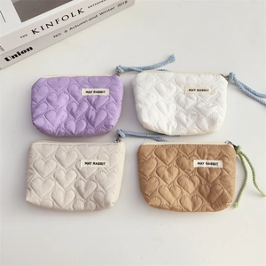 Quilted heart pattern mini pouch set in purple, white, beige and camel with wrist strap