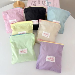 Close-up of colorful macaron mini storage bags with zipper and Mayrabbit label