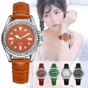 Detail of luxury quartz watch with diamond bezel and multiple leather strap color options