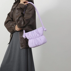 Purple puffer shoulder bag with ruched texture and knotted strap for daily casual wear