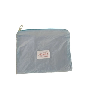 Mini light blue macaron storage bag with zipper and Mayrabbit minimalist fabric label