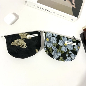 Floral and butterfly jacquard makeup bags set with magazines and wireless earbuds