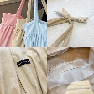 Linen cotton tote bag with bow straps and pleated detail in macaron pastel colors