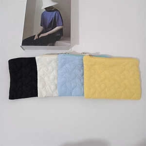 Quilted heart candy color mini pouches in black, beige, blue and yellow with zipper