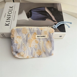 Detail of floral tulip storage bag with MAY RABBIT label on a Kinfolk magazine