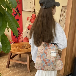Ethnic style floral patchwork denim tote bag with spacious capacity and SEEYOU label