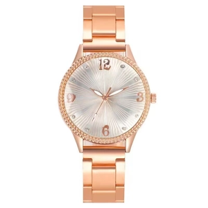 Rose gold women's watch with rhinestone bezel and grey sunray dial on white background