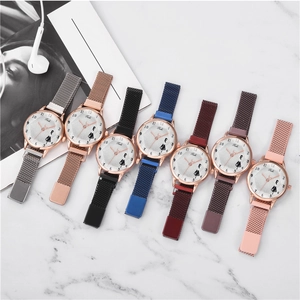 Flat lay of seven colorful women's mesh strap watches with magnetic bands and cat patterns
