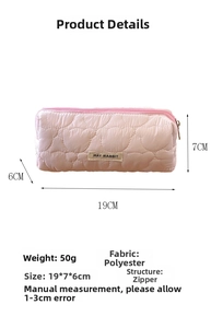 Pink heart quilted polyester pencil case measuring 19x7x6cm with zipper and brand label