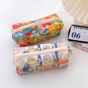 Quilted floral pencil cases with cute patterns and metal zipper on white desk