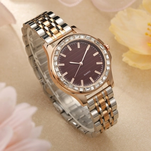 Elegant rose gold and silver quartz watch with crystal bezel and brown wave dial