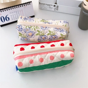 Quilted floral and polka dot makeup pouch set with zipper closure for storage