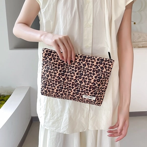 Corduroy leopard print cosmetic bag with large capacity and secure zipper for travel