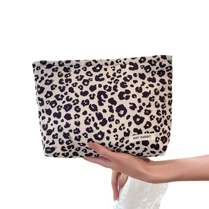 Chic corduroy leopard print makeup bag with large capacity for travel and cosmetics