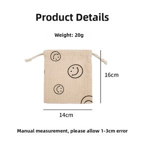 Detail view of corduroy smiley face drawstring pouch with dimensions 14x16cm and 20g weight