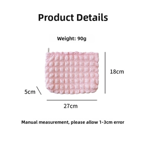 Pink bubble quilted cosmetic bag dimensions: 27cm x 18cm x 5cm with metal zipper detail
