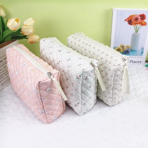 Quilted cotton cosmetic bags with pink star, cherry and floral prints and metal zipper