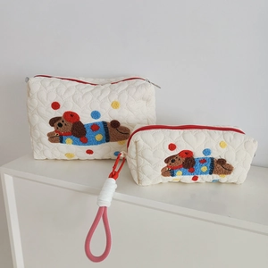Quilted heart pattern makeup bag set with cartoon puppy embroidery and red zipper