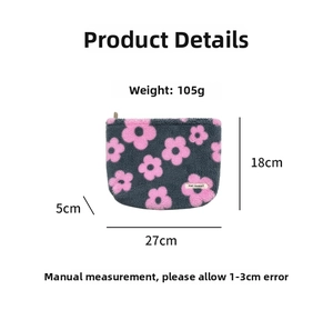 Detail view of plush flower makeup bag showing dimensions 27x18x5cm and 105g weight