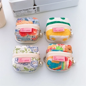 Quilted cotton earbud cases with pearl zipper pull and cute mini tent fabric designs