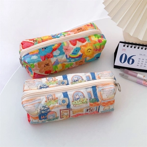 Detailed view of quilted cotton pouches with cute cartoon bear and rabbit patterns
