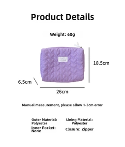 Detail of purple quilted makeup bag featuring heart pattern texture and size dimensions