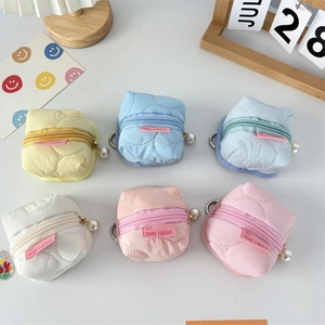 Quilted earphone pouches in macaron colors with pearl zippers and metal D-rings