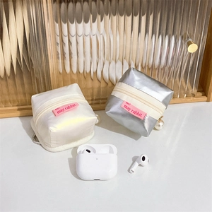 3D tent-shaped earphone case in pearl white and silver with pearl charm and gold zipper