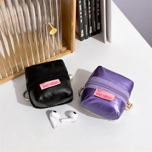 Cute tent-shaped mini storage cases in black and purple with pearl zipper charms