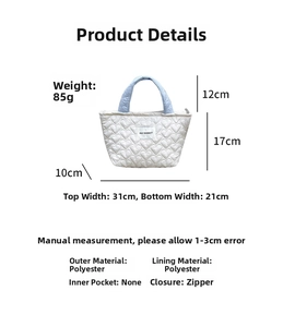 Quilted heart tote bag dimensions showing width 31cm and height 17cm with light blue handles