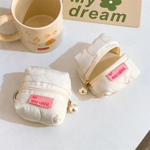 Quilted white mini tent earphone cases with elegant pearl zippers and pink logo tags