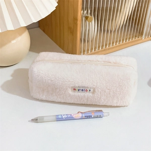 Plush lamb wool pencil case in cream white with a large capacity zipper closure