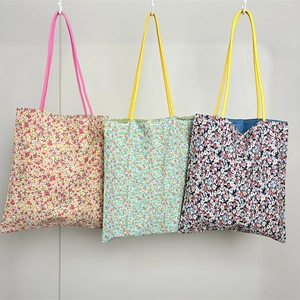 Floral canvas tote bags set in three patterns with long shoulder straps for women