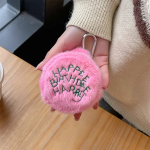 Close-up of pink plush round coin purse with Happee Birthdae Harry embroidery