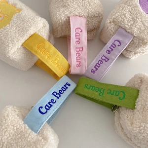 Lot de 5 trousses à maquillage en peluche avec poignées colorées et broderie Care Bears