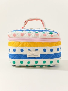 Quilted cotton makeup bag with colorful patterns and handle for travel organization