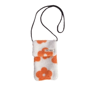Mini sac bandoulière en peluche blanche avec motif fleur orange et sangle noire